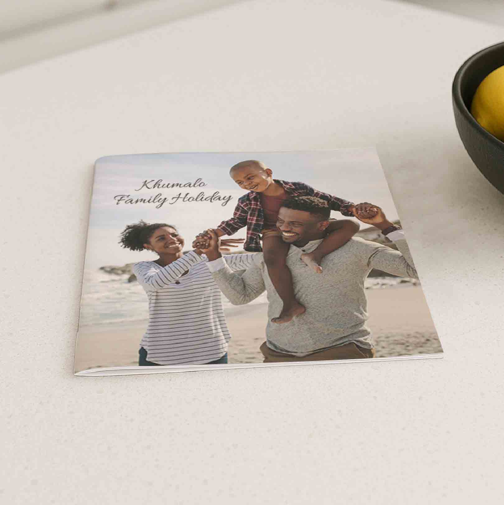 200x200 personalised softcover photobook with family holiday theme and travel photos on cover