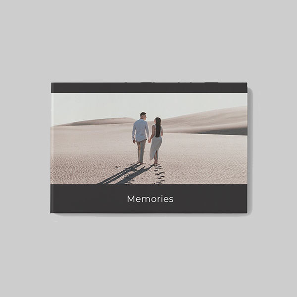 A5 landscape softcover photobook with modern black AI theme showing personalised photos, sleek layouts and contemporary print design.