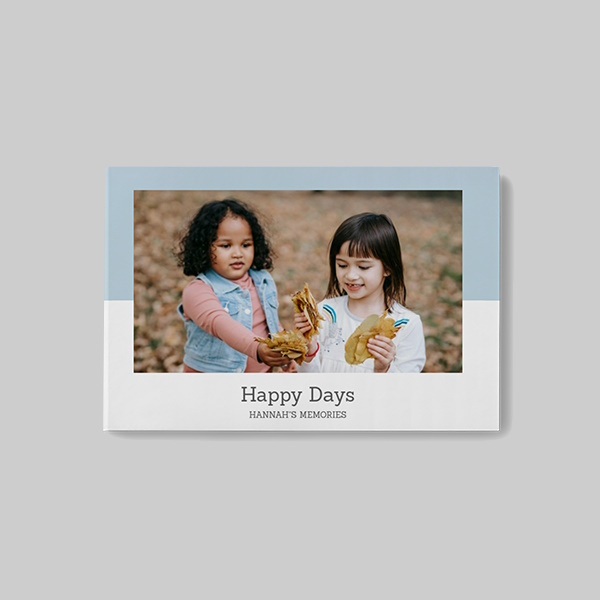 Pastel Blue AI Theme A5 Landscape Softcover Photobook with personalised photo cover and soft pastel blue AI-designed layout