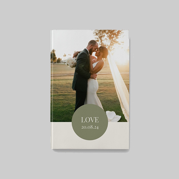 A4 portrait hardcover wedding photobook with AI theme showing personalised wedding photos, elegant layouts and premium hardcover finish.