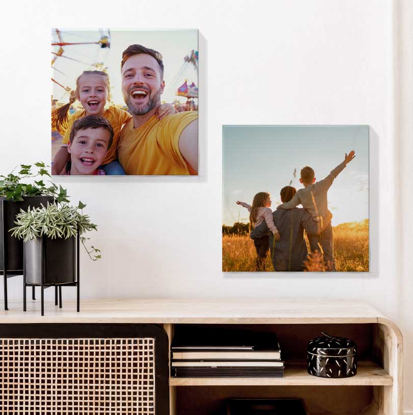 Set of 2 personalised 200x200mm stretched canvas photo prints displayed together on wall