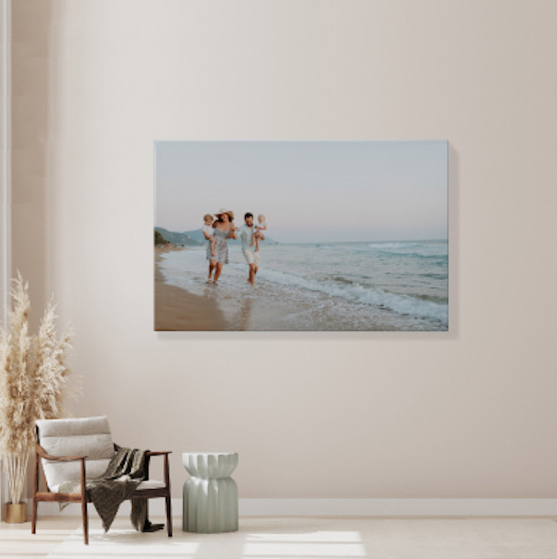 800x1100mm stretched canvas print with family walking on beach together along shoreline