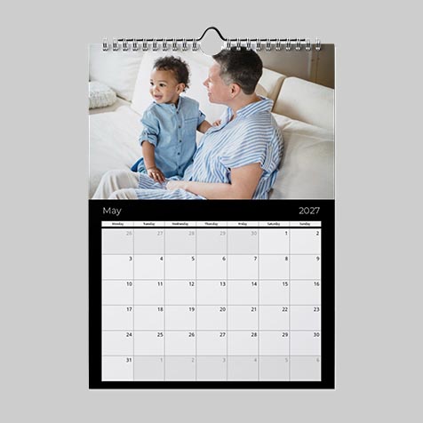 A3 portrait minimalist black themed personalised photo calendar with custom images and clean modern design.