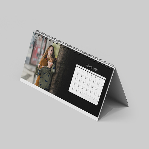 Desktop landscape classic fade themed personalised photo calendar with soft gradient design and custom images.