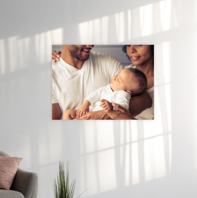 400x500mm foam board print with photo of couple holding young baby together indoors warmly
