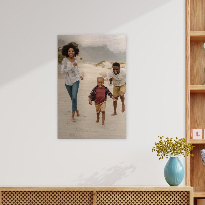 450x300mm brushed silver aluminium print with photo of family running on beach together