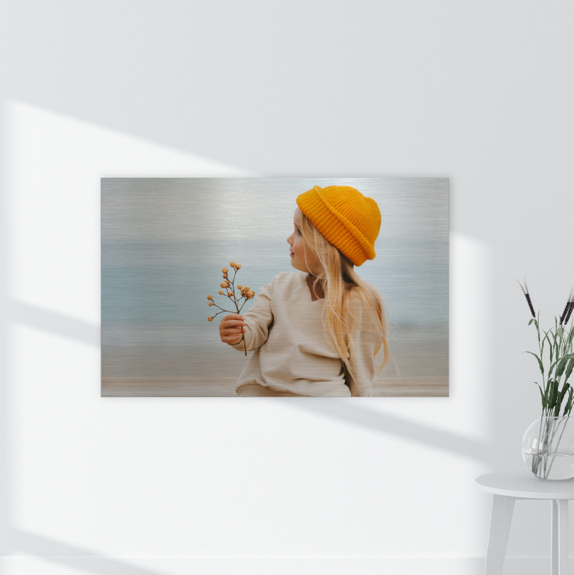 450x600mm brushed silver aluminium print with photo of girl holding flowers on beach during outdoor photoshoot