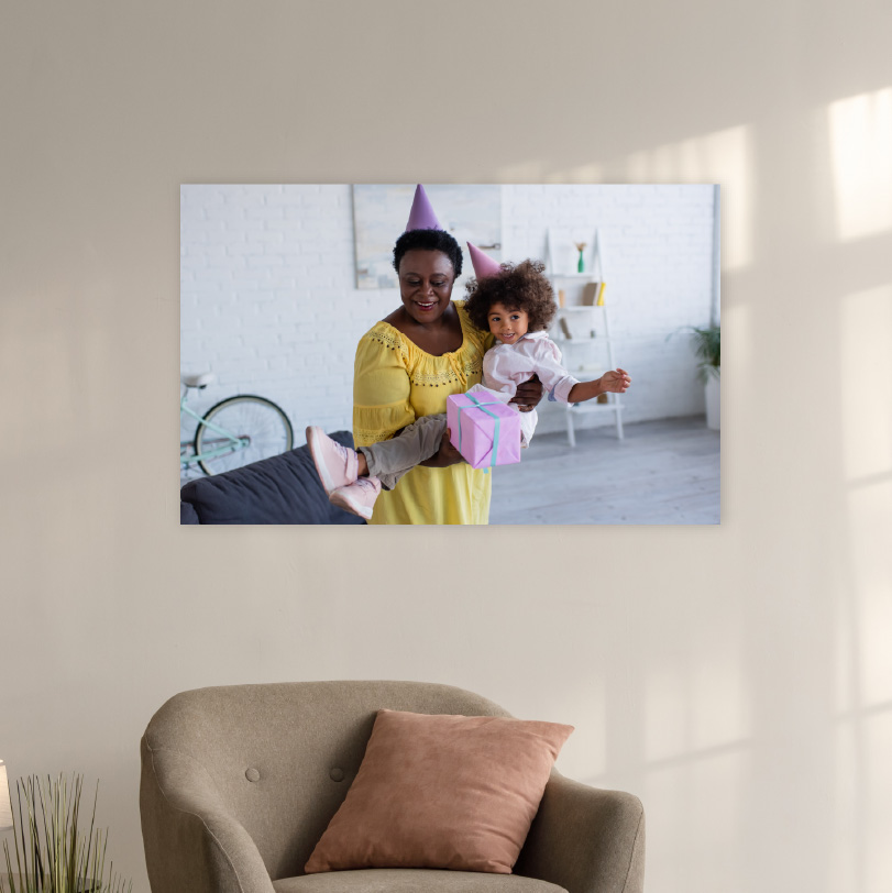 450x600mm foam board print with photo of mom holding daughter wearing party hats celebrating together