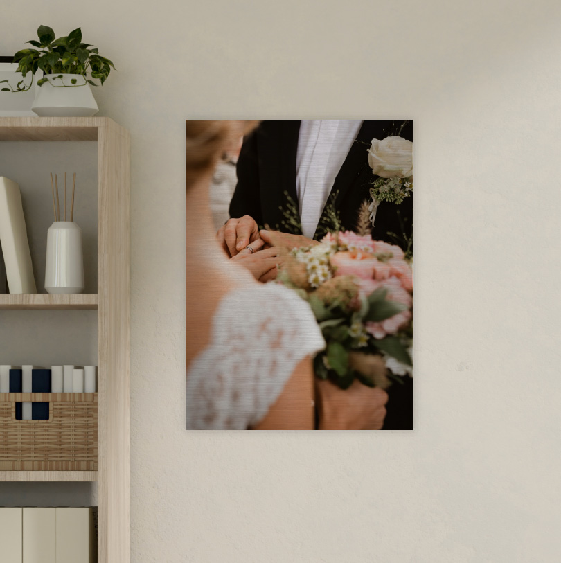 500x400mm brushed silver aluminium print with photo of wedding couple exchanging rings during ceremony