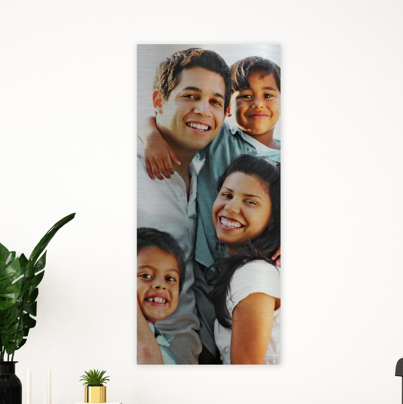 600x200mm brushed silver aluminium print with photo of father and three children together outdoors or at home