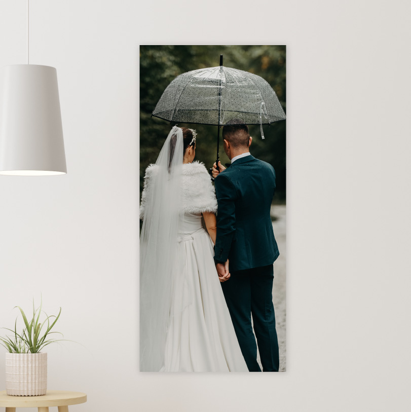 600x200mm foam board print with photo of wedding couple holding umbrella together outdoors romantic scene