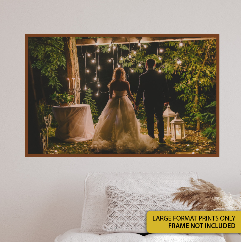 600x900mm large format print with happy wedding couple under fairy lights romantic evening wedding photograph