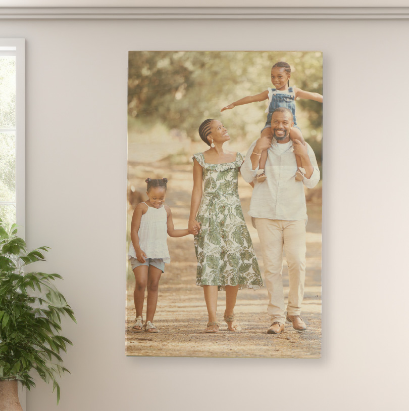 750x500mm birch wood photo print showing happy family walking down path on natural wooden panel