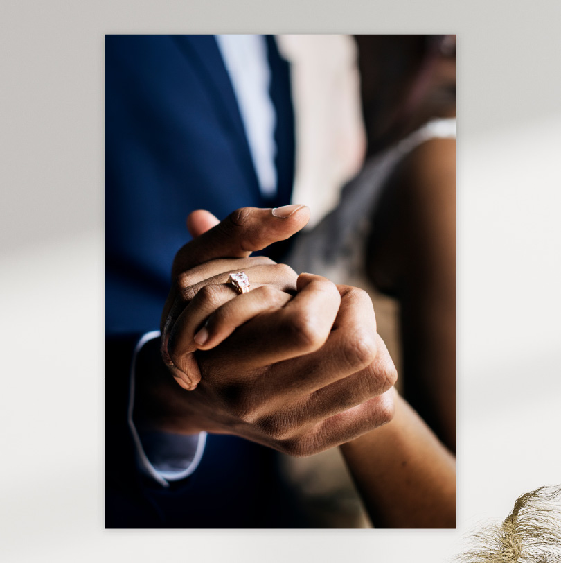 900x600mm foam board print with photo of wedding couple dancing focusing on hands holding together lovingly