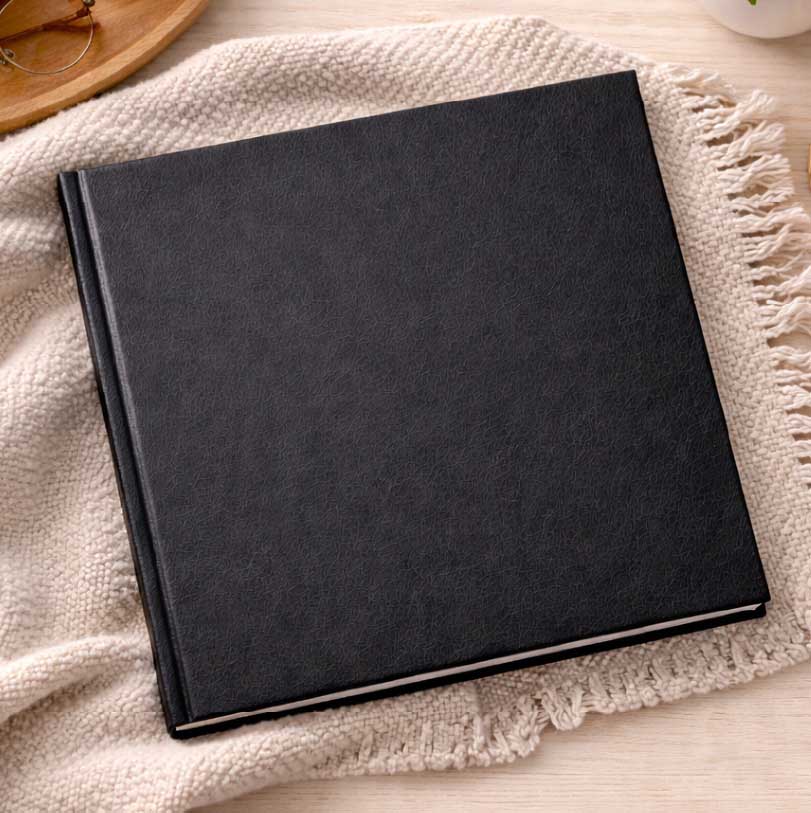 300x300mm lay-flat standard hardcover photobook with photographic print finish and flat opening panoramic spread