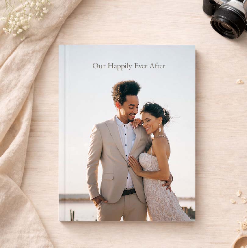 A4 portrait lay-flat personalised hardcover photobook with photographic print finish and flat opening panoramic spread