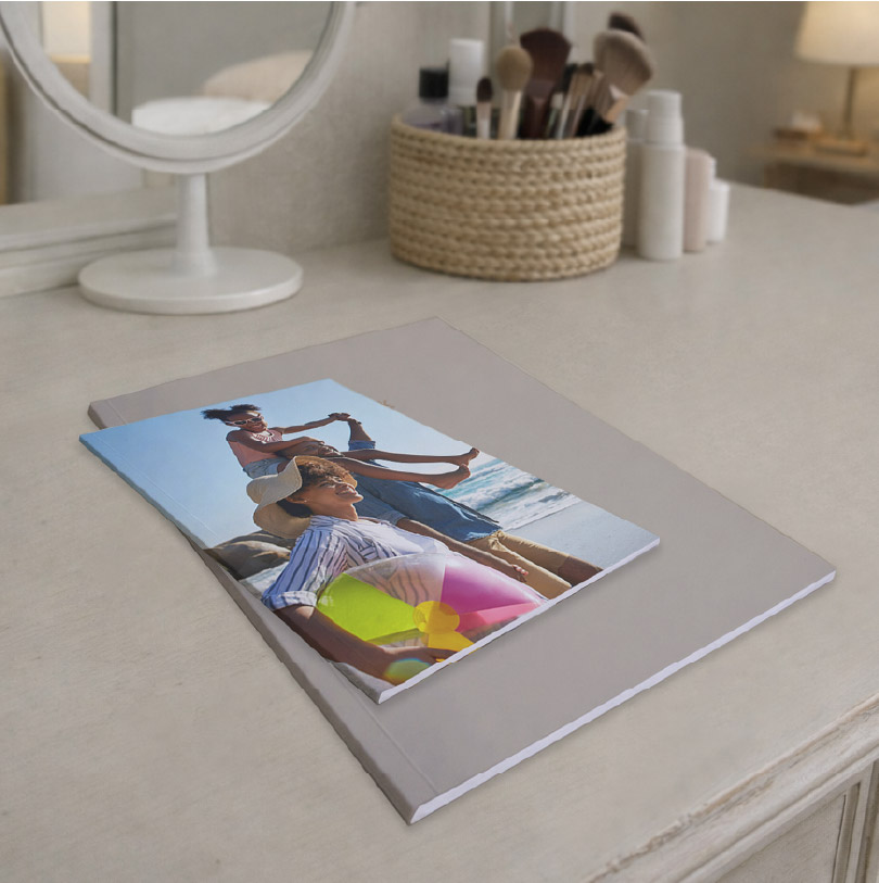 A5 portrait personalised glue bound softcover photobook with family beach photos on cover design