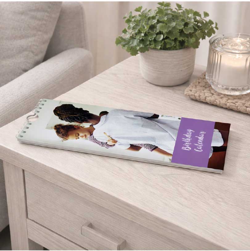 Birthday calendar with mother and daughter cover photo showing a loving family portrait used for personalised birthday reminder calendar design