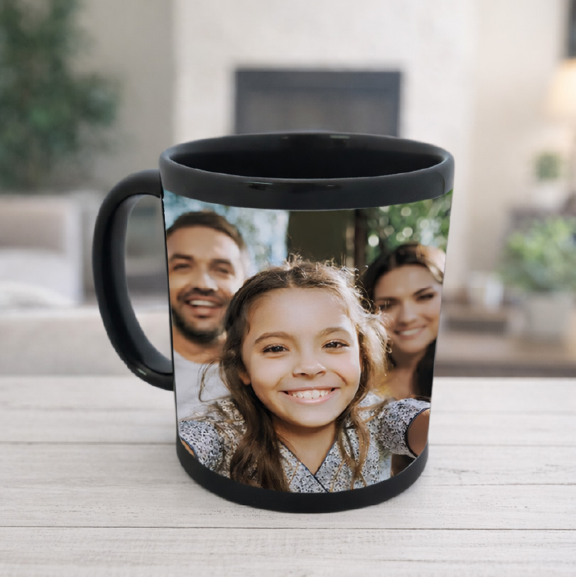 Personalised black ceramic mug with custom photo print for gift and drinkware use