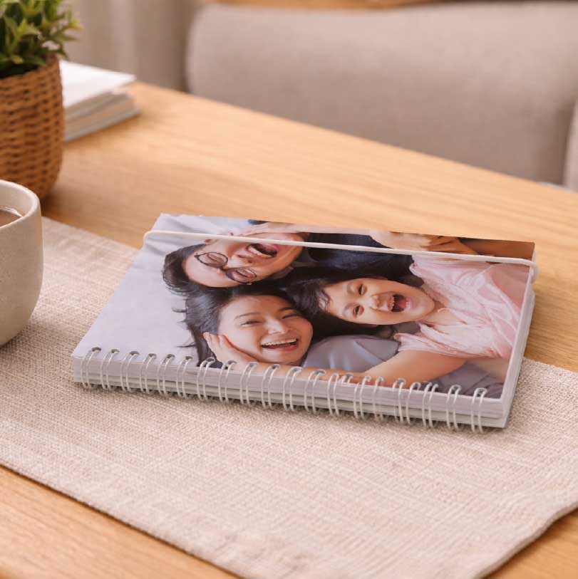 A6 journal with photo of happy mother and daughters on cover showing personalised family portrait design used for journal stationery product
