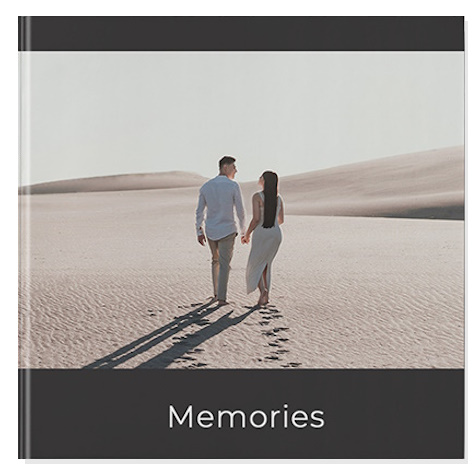 AI themed photobooks with a modern black theme, featuring personalised photo albums designed with a minimalist dark aesthetic for stylish memory keeping.