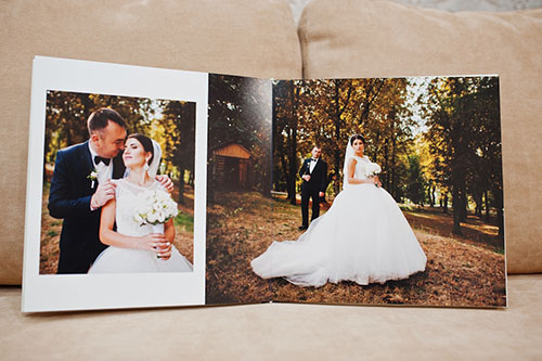 Lay flat wedding book open on a table