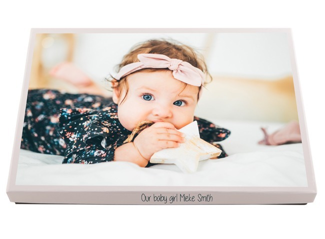 Personalised photo box printed with a photo of a baby playing with toys, ideal for storing and presenting treasured family photographs.
