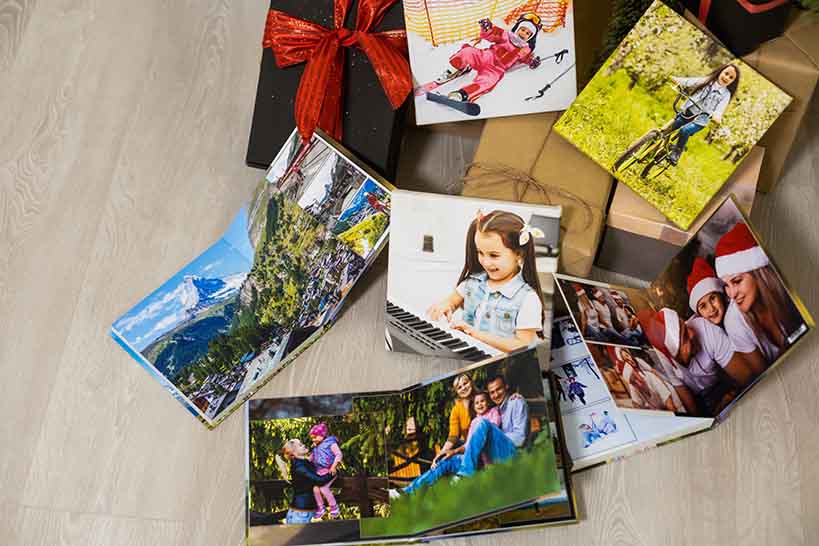 Various Photobooks Showcasing Family Activities | Memory Collection Various photobooks displaying family activities and memories captured in printed photo albums.