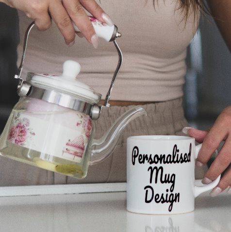 Woman pouring tea into a personalised mug